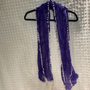 Purple scarf with lil white trim balls
